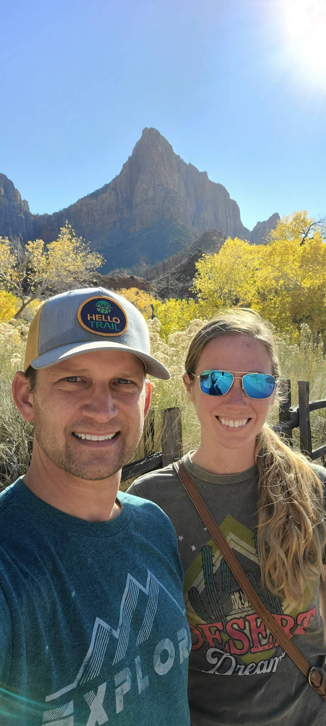 Andrew and Ashley with the Watchman at Zion National Park behind them.